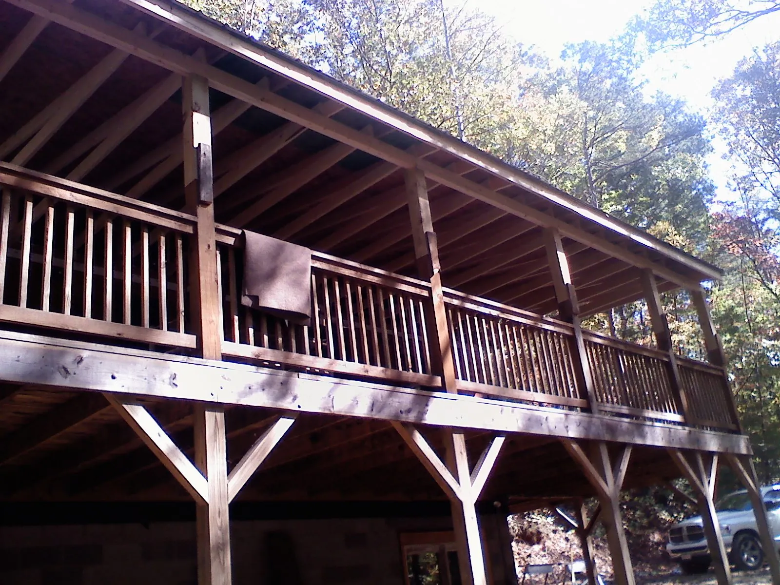 Timber framing under a new elevated porch and deck — Roof Leak Repair in Westwood by Roofing Brothers